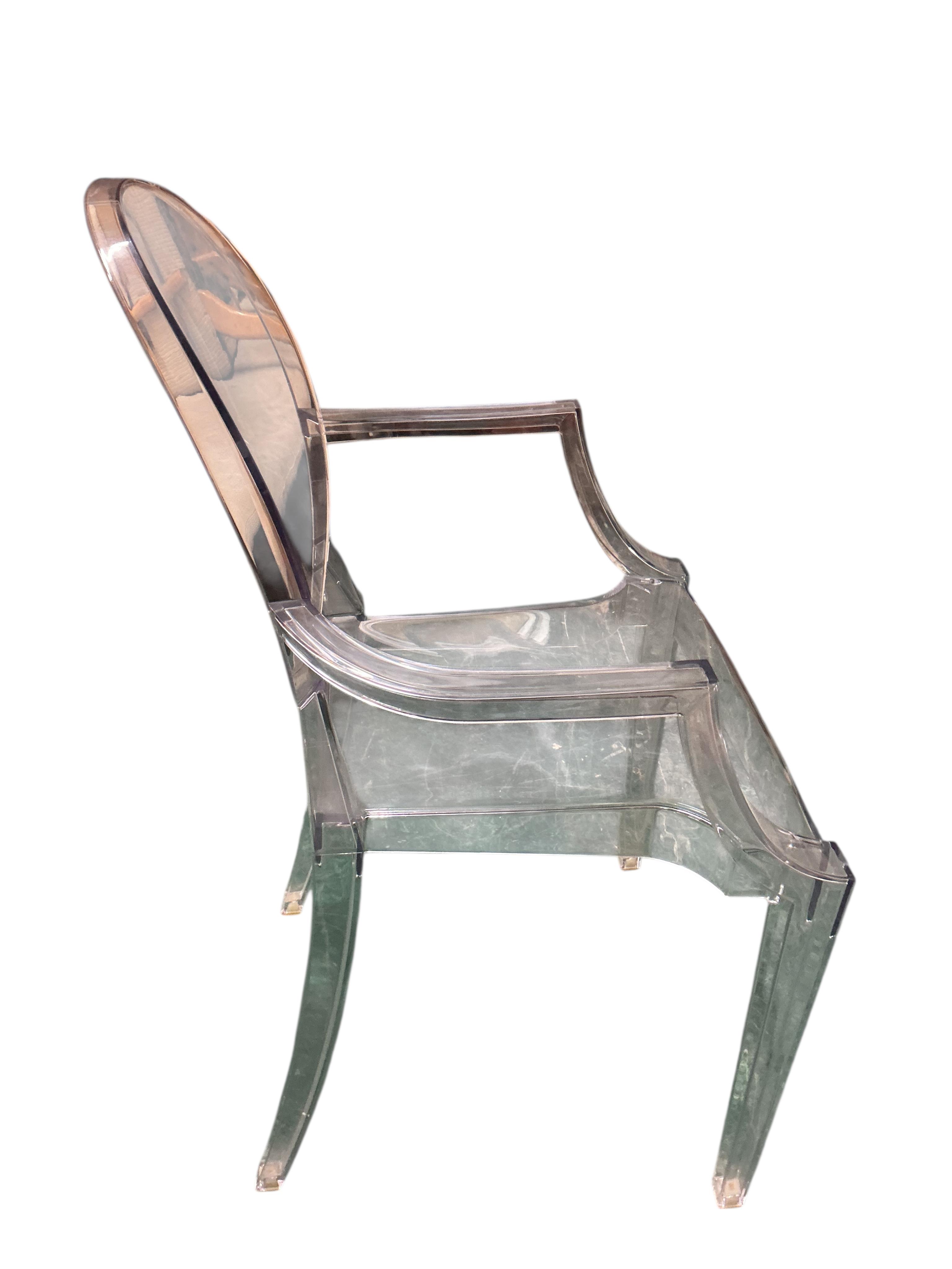 Three Philippe Stark Louis Ghost chairs by Kartell, width 54cm, depth 50cm, height 98cm